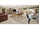 Spacious game room with a stone fireplace, pool table, air hockey and staircase at 4995 Aviary Nw Dr, Acworth, GA 30101