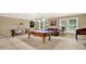 Spacious game room featuring a pool table, air hockey, and other entertainment options at 4995 Aviary Nw Dr, Acworth, GA 30101