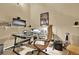 Home office with modern desk, computer, and other office furniture, including a comfortable-looking chair at 4995 Aviary Nw Dr, Acworth, GA 30101