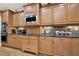 Gourmet kitchen features granite countertops, stainless appliances, and ample storage at 4995 Aviary Nw Dr, Acworth, GA 30101
