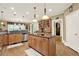 Spacious kitchen featuring granite countertops, stainless steel appliances, and custom cabinetry at 4995 Aviary Nw Dr, Acworth, GA 30101