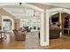 Spacious living room boasts hardwood floors, fireplace, built-ins, and beautiful architectural details at 4995 Aviary Nw Dr, Acworth, GA 30101
