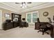 Home office with trey ceiling, carpet, large windows, and ample workspace at 4995 Aviary Nw Dr, Acworth, GA 30101