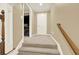 Carpeted staircase between floors at 4995 Aviary Nw Dr, Acworth, GA 30101