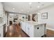 Bright, open kitchen featuring granite countertops, stainless steel appliances, and a large island at 5365 Vendelay Ln, Cumming, GA 30040
