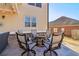 Cozy backyard patio with a stone fire pit surrounded by comfortable seating at 5365 Vendelay Ln, Cumming, GA 30040