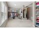 Spacious walk-in closet with windows for natural light, ample shelving, and full-length mirror at 5365 Vendelay Ln, Cumming, GA 30040