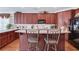 Beautiful kitchen with custom cabinetry, countertop seating, and modern appliances at 836 Windsor Place Ct, Grayson, GA 30017