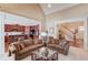 Inviting living room with fireplace, vaulted ceilings, and open concept design at 836 Windsor Place Ct, Grayson, GA 30017