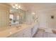 Main bathroom with double sink vanity, large mirror, and separate shower and tub at 836 Windsor Place Ct, Grayson, GA 30017