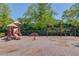 Fun community playground with swings, slide, and climbing dome for of all ages at 836 Windsor Place Ct, Grayson, GA 30017