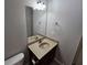 Bathroom vanity with sink, large mirror and brushed nickel accessories at 1021 Rock Elm Dr, Auburn, GA 30011