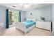 Bright bedroom featuring large window with blue curtains and ample natural light at 1879 Beaver Dam Ne Ln, Marietta, GA 30062