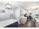 Stylish kitchen with an island, white cabinets, and stainless steel appliances at 1879 Beaver Dam Ne Ln, Marietta, GA 30062