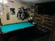 Fun game room featuring a pool table, trophy shelves, and a wall-mounted television at 5814 Highgrove Dr, Atlanta, GA 30349