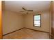 Bedroom features a ceiling fan and natural light, perfect for a restful retreat at 1112 Mountain Springs Nw Dr, Kennesaw, GA 30144