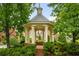 Inviting gazebo with classic columns, brick accents, and meticulously landscaped surroundings at 1227 Parkside Village Nw Dr, Marietta, GA 30060