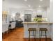 Stylish kitchen with granite countertops, bar seating, and modern appliances at 1227 Parkside Village Nw Dr, Marietta, GA 30060