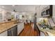Modern kitchen with granite countertops, stainless steel appliances, and ample cabinet space at 1227 Parkside Village Nw Dr, Marietta, GA 30060