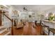 Open-concept living area with hardwood floors, a fireplace, and elegant furnishings at 1227 Parkside Village Nw Dr, Marietta, GA 30060