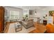 Cozy living room featuring hardwood floors and natural light at 1227 Parkside Village Nw Dr, Marietta, GA 30060