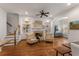Cozy living area featuring a fireplace, built-in shelves, and hardwood floors at 1227 Parkside Village Nw Dr, Marietta, GA 30060