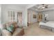 Bright main bedroom with seating, and a door leading to a private balcony at 1227 Parkside Village Nw Dr, Marietta, GA 30060
