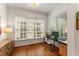 Bright office space featuring large windows and wood floors at 1227 Parkside Village Nw Dr, Marietta, GA 30060