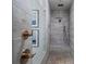 Contemporary bathroom with a tiled shower, bronze fixtures, and a built-in bench at 124 Everley Walk, Alpharetta, GA 30009