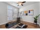 Bright room set up for exercise with a full-length mirror and equipment at 124 Everley Walk, Alpharetta, GA 30009