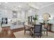 Bright eat-in kitchen with an island, stainless appliances and lots of white cabinets at 124 Everley Walk, Alpharetta, GA 30009