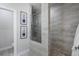Walk-in shower with tile surround and a glass enclosure provides a spa-like feel at 124 Everley Walk, Alpharetta, GA 30009