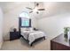 Cozy bedroom with vaulted ceiling, plush carpet, window and neutral décor at 1100 Ashbury Dr, Decatur, GA 30030