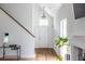 Bright foyer with hardwood floors, high ceilings, a staircase and natural light at 1100 Ashbury Dr, Decatur, GA 30030