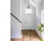 Bright foyer with hardwood floors, high ceilings, a staircase and natural light at 1100 Ashbury Dr, Decatur, GA 30030