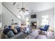 Spacious living room featuring vaulted ceilings, fireplace, and hardwood floors at 1100 Ashbury Dr, Decatur, GA 30030