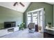 Well-lit office featuring a large bay window, ceiling fan, and neutral carpet at 1100 Ashbury Dr, Decatur, GA 30030
