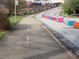 Streetscape including a bike path and colorful planters at 1100 Ashbury Dr, Decatur, GA 30030