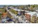 Aerial view of the community's main street, showcasing nearby shops, restaurants, apartments, and condominiums at 1348 Grannysmith Trce # 39, Brookhaven, GA 30319