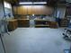 A basement with finished cabinets, a workbench, and space for activities at 1811 Murdock Rd, Marietta, GA 30062
