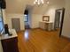 Bright bedroom boasts hardwood floors, a window seat, and a vanity area, creating a cozy retreat at 1811 Murdock Rd, Marietta, GA 30062