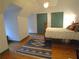Cozy bedroom featuring vaulted ceilings, hardwood floors, and blue trim at 1811 Murdock Rd, Marietta, GA 30062