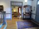 Foyer with hardwood floors, staircase, hall tree, and glimpses into adjacent rooms at 1811 Murdock Rd, Marietta, GA 30062