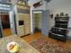 Traditional kitchen featuring a wooden island, hardwood floors, classic stove, and a walk-in pantry at 1811 Murdock Rd, Marietta, GA 30062