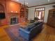 Warm and inviting living room featuring a fireplace, built-in shelves, hardwood floors, and traditional decor at 1811 Murdock Rd, Marietta, GA 30062