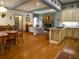 Spacious open-concept home features a dining area, fireplace, and well-lit kitchen at 1811 Murdock Rd, Marietta, GA 30062