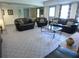 A spacious living room features modern furniture, neutral carpet and natural light at 1811 Murdock Rd, Marietta, GA 30062