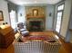Living room features a stone fireplace, hardwood floors, and abundant natural light, creating a warm and inviting atmosphere at 1811 Murdock Rd, Marietta, GA 30062