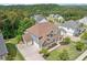 Two-story home with an expansive front lawn in a neighborhood surrounded by lush green hills and trees at 2121 Harmony Dr, Canton, GA 30115