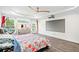 Beautiful bedroom with a big screen television, large windows, and a ceiling fan at 2121 Harmony Dr, Canton, GA 30115